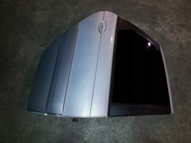 Portiera posteriore dx di una Renault scenic RX4 del 2003