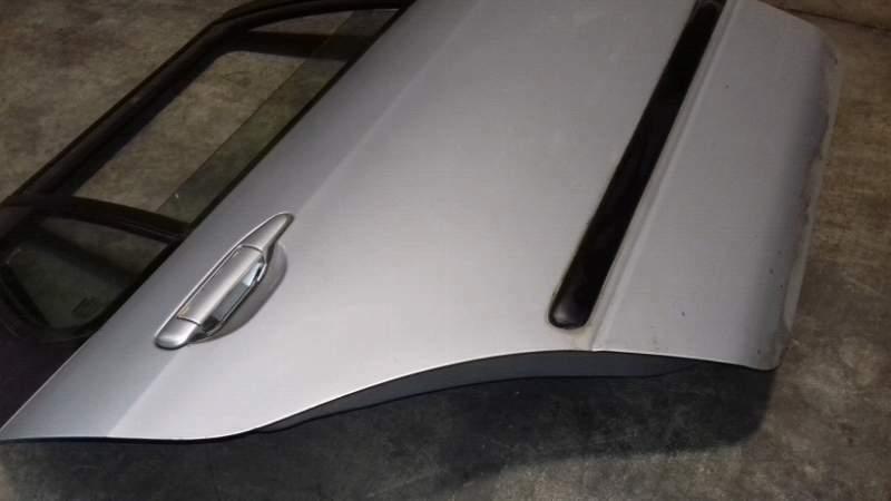 Portiera posteriore dx usata Nissan primera 2.0 td sw del 1999