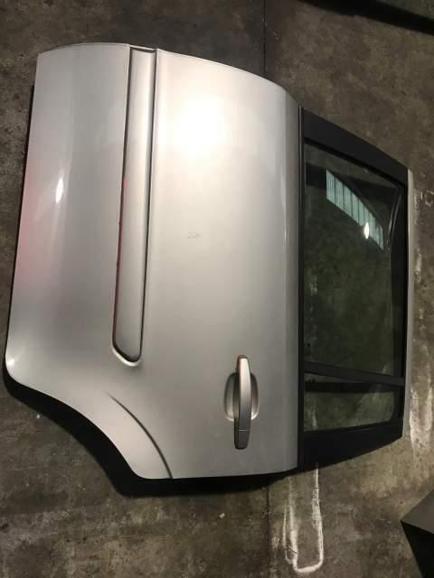 Portiera posteriore sinistra Opel zafira &quot;2007&quot; grigio chiaro